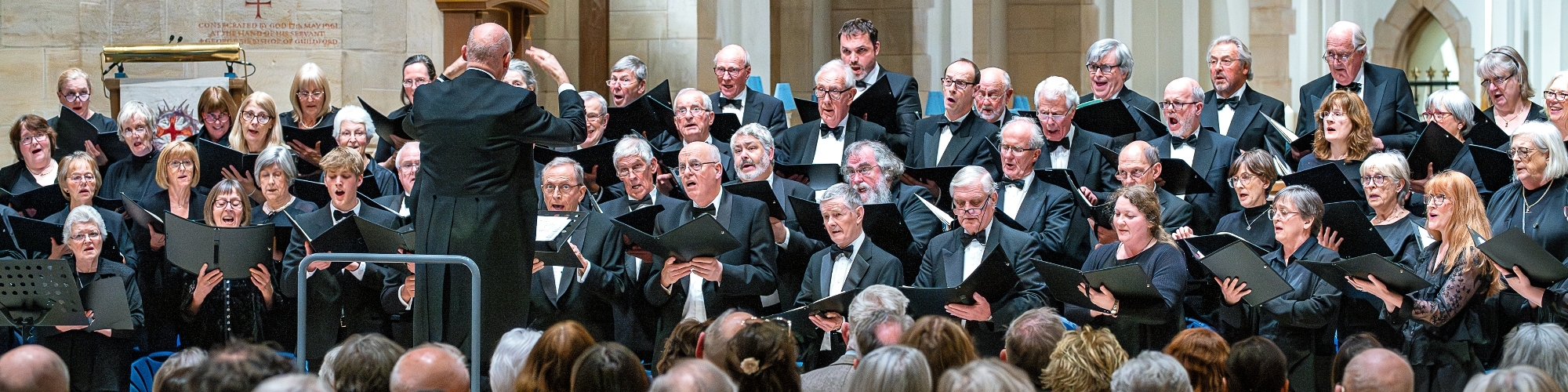 Richard Pearce conducting the choir at the O Magnum Mysterium concert